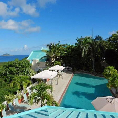 Flamboyan On The Bay Resort & Villas Canaan Bagian luar foto